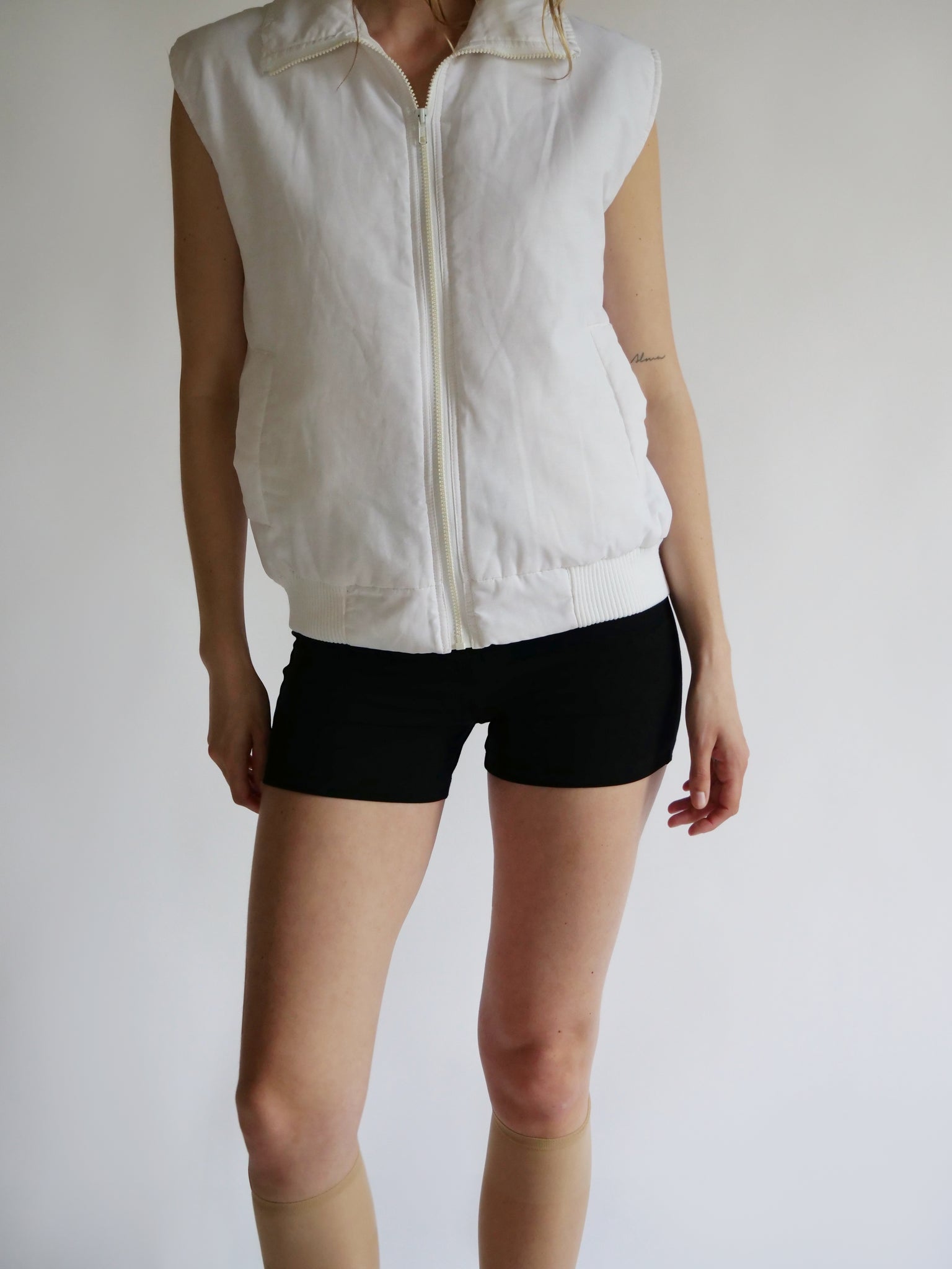 White puffer vest